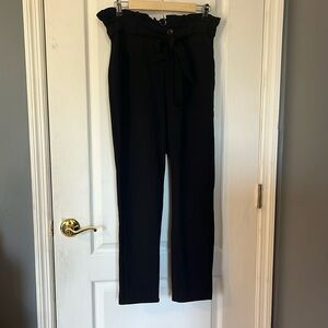 SHEIN solid black polyester/spandex pants with ribbed waistline and belt.